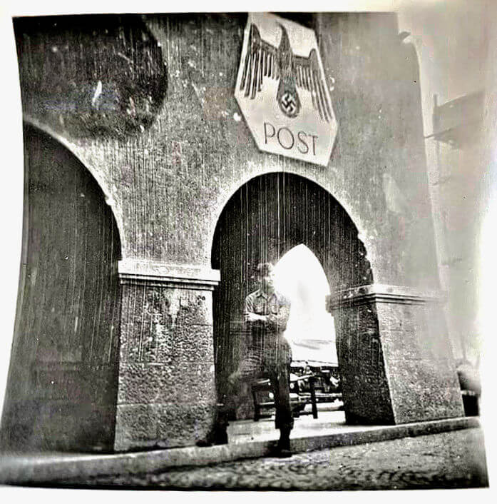 American soldier in front of post office near Berchtesgaden American soldier in front of post office near Berchtesgaden