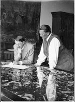 Hitler and Goering looking at plans on table Hitler and Goering looking at plans on table
