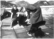 Hitler and Eva Braun with her Scotties at the Berghof Hitler and Eva Braun with her Scotties at the Berghof