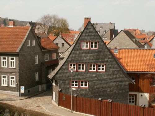 Street scene in Goslar, Harz, Germany, gray houses with red tiled roofs