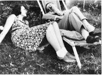 Hitler and Geli Raubal on grass Hitler and Geli Raubal on grass