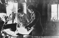 Hitler and Albert Speer at Haus Wachenfeld, looking at plans. Hitler and Albert Speer at Haus Wachenfeld, looking at plans.
