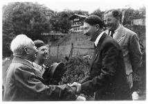 Hitler in Berghof driveway, Hotel zum Turken behind Hitler in Berghof driveway, Hotel zum Turken behind
