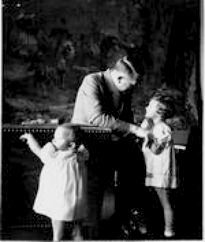 Hitler with little girl inside the Berghof Hitler with little girl inside the Berghof