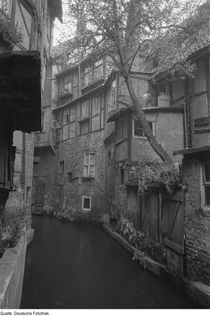 Quedlinburg in the post war period, houses along a stream Quedlinburg in the post war period, houses along a stream