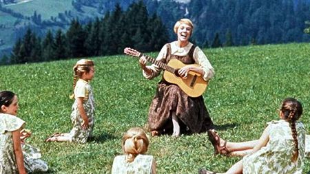 Maria singing with the Trapp children on the mountain